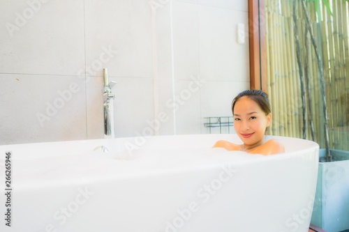 Portrait beautiful young asian woman in the bathtub for take a bath
