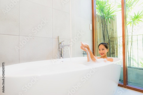 Portrait beautiful young asian woman in the bathtub for take a bath