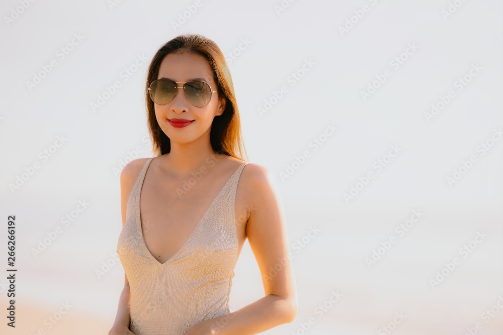 Portrait beautiful young asian woman smile happy walk on the tropical outdoor nature beach sea Portrait beautiful young asian woman smile happy walk on the tropical outdoor nature beach sea