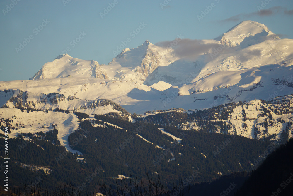 Fototapeta premium aerial view of Mont Blanc, France at dusk with wisps of clouds