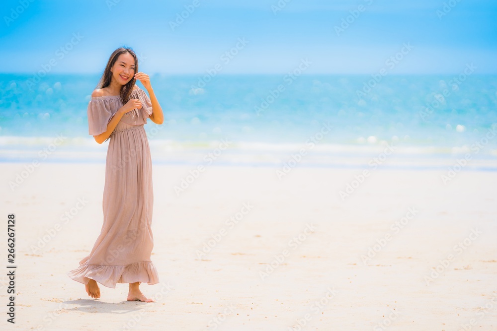 Portrait beautiful young asian woman smile happy walk on the tropical outdoor nature beach sea Portrait beautiful young asian woman smile happy walk on the tropical outdoor nature beach sea