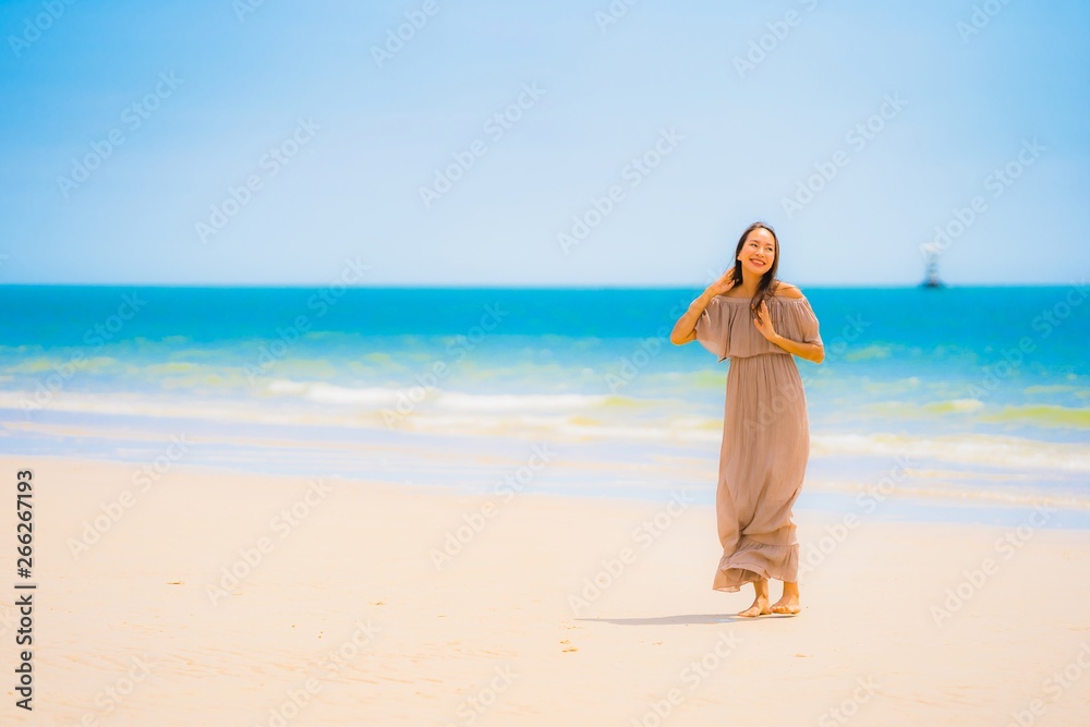 Portrait beautiful young asian woman smile happy walk on the tropical outdoor nature beach sea Portrait beautiful young asian woman smile happy walk on the tropical outdoor nature beach sea