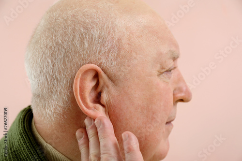 Senior man with hearing pro...