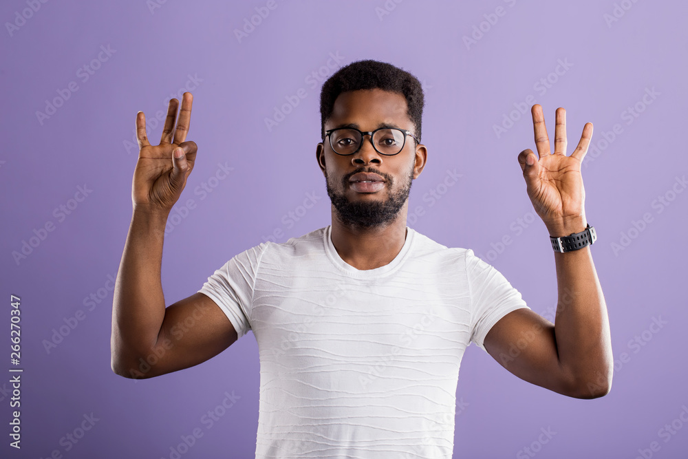 Naklejka premium Portrait of handsome young african american man