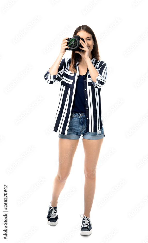 Young female photographer on white background Young female photographer on white background