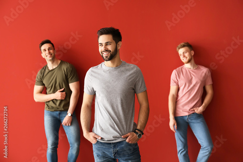 Fashionable young men on co...