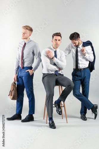 Fashionable young men on li...