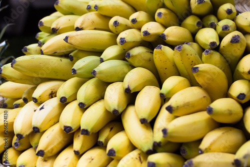 appetizing bananas on counter in market