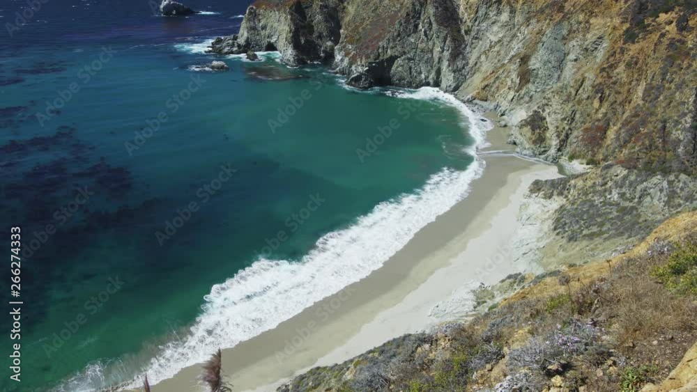Bixby Creek overpass with waves from above, looking out onto the Pacific Ocean in Big Sur, California.