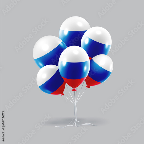 Bunch of glossy bright russian flag balloons hanging over neutral gray background. (ID: 266274733)