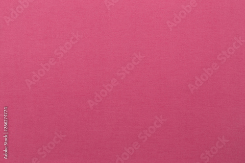 Overview of pink cotton fabric with textile texture background