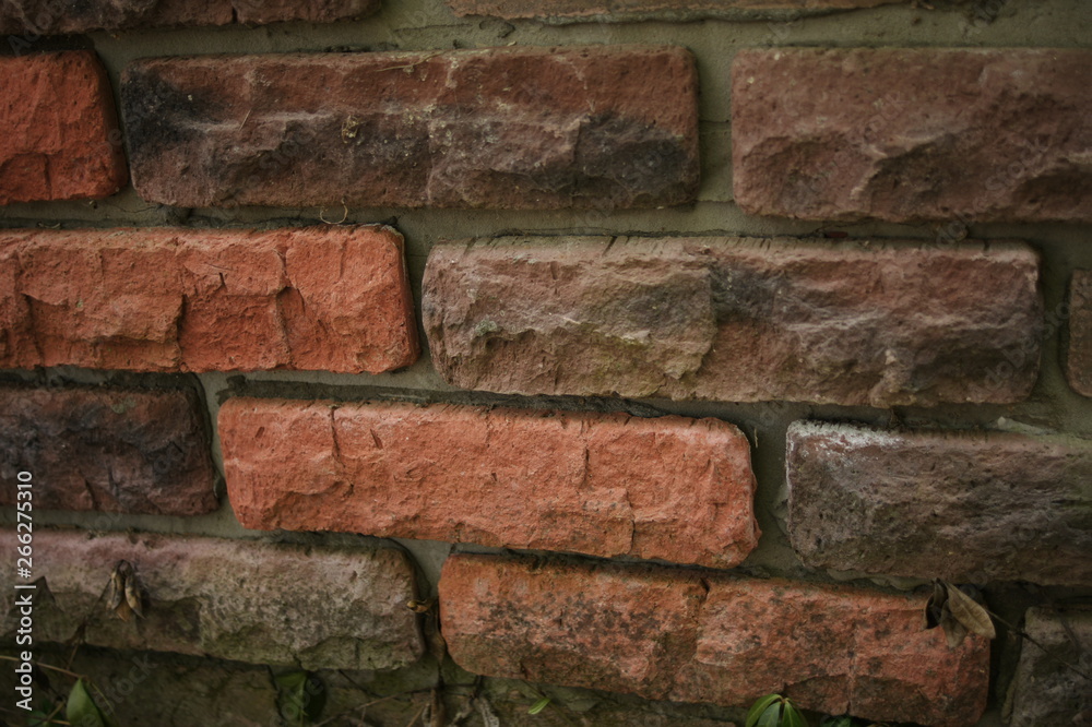 Obraz premium Brick wall. Red brick texture. Terracotta orange bricks. Background, background.