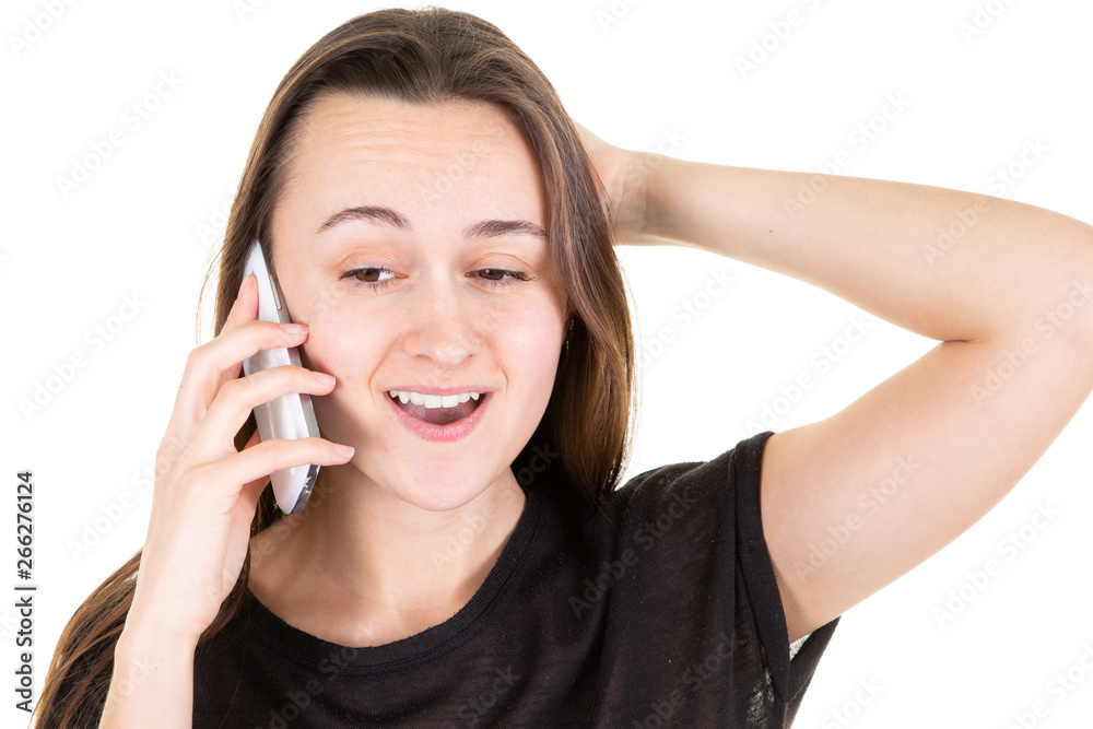 Portrait of an excited young girl standing talking conversation on smartphone Portrait of an excited young girl standing talking conversation on smartphone