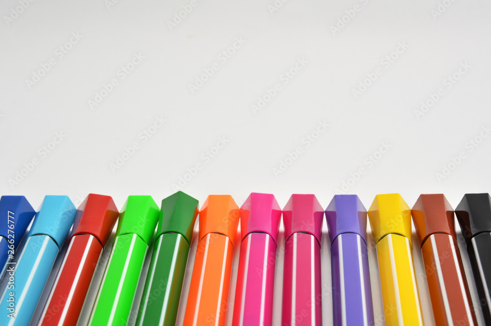 Multi colored felt tip pens on white background Multi colored felt tip pens on white background