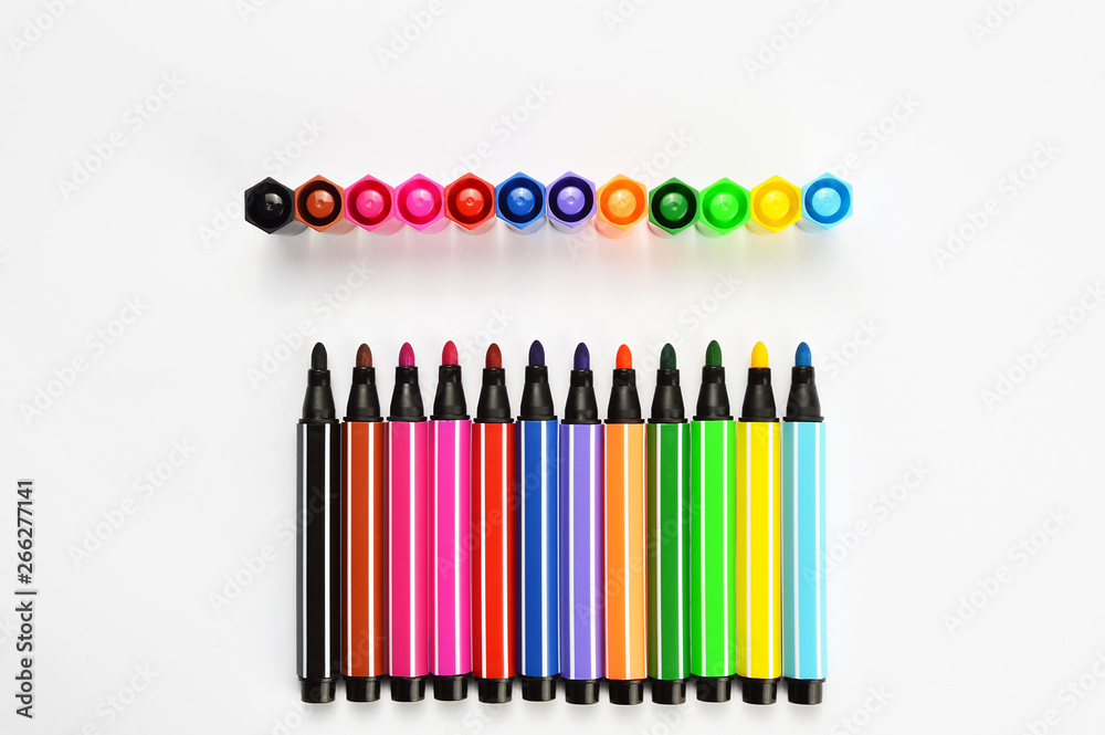 Fototapeta premium Multi colored felt tip pens on white background