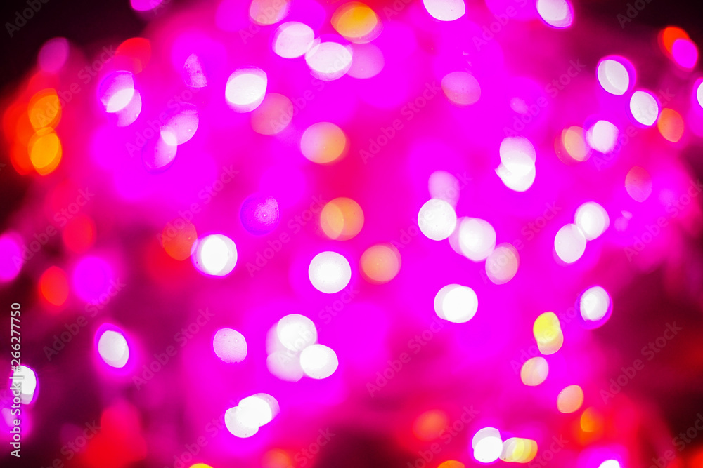 Bokeh abstract texture. Colorful. Defocused background. Blurred bright light. Circular points