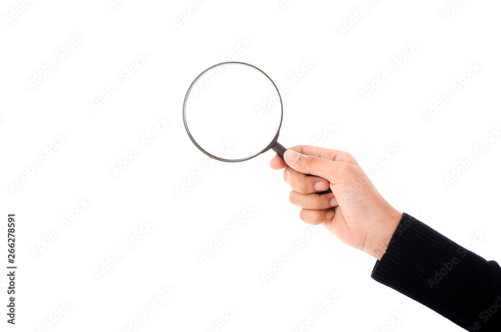 Hand holding magnifying glass isolated on white background Hand holding magnifying glass isolated on white background
