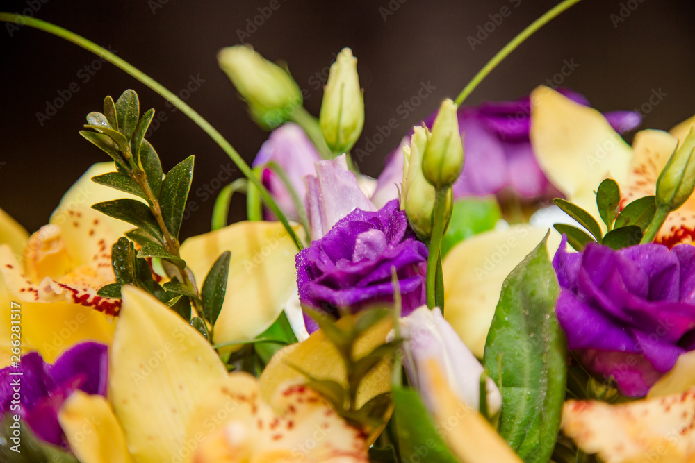 Fototapeta premium Yellow orchid bouquet in a box