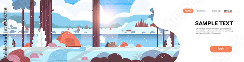 tents camping area in forest winter camp concept sunny day sunrise snowy landscape nature background with water mountains and hills flat horizontal copy space