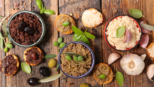 assorted of tapenade with leaf and ingredient