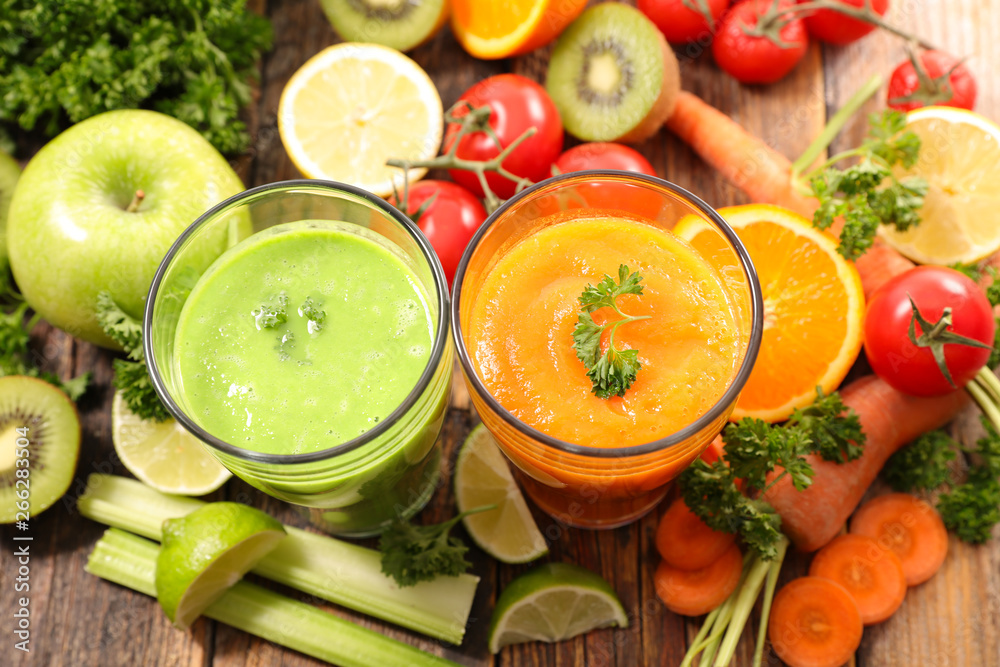 glasses of vegetable smoothie with ingredient glasses of vegetable smoothie with ingredient