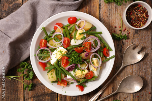 vegetable salad with egg, potato, bean and onion