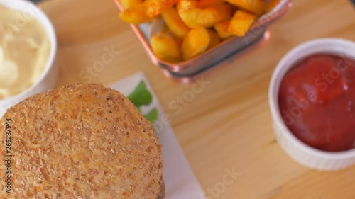 Wallpaper Mural Juicy American burger with crunchy french fries. Slow motion Torontodigital.ca