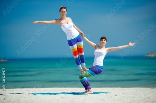 Portrait of a gorgeous young woman practicing yoga. The concept of a healthy lifestyle. Sport.