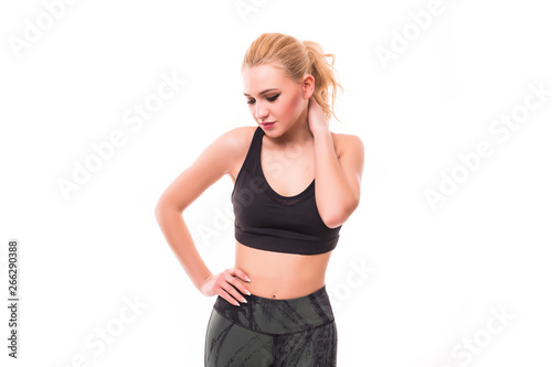 Fitness young woman with neck pain over white background © dianagrytsku