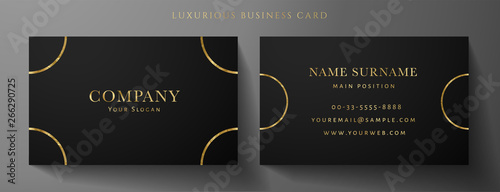 Luxury black Business card design template with gold Art Deco circle lines (VIP Gift Card). Dark background with golden modern round lines