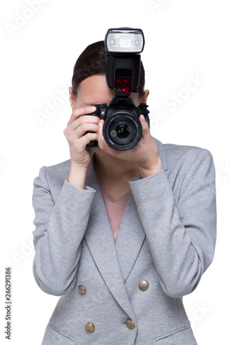 Asian Woman Photographer hold camera with external flash point to shoot subject, wear formal black suit. studio lighting white background isolated copy space, reporter journalist take photo celebrity