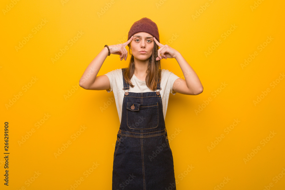 Young hipster woman doing a concentration gesture Young hipster woman doing a concentration gesture