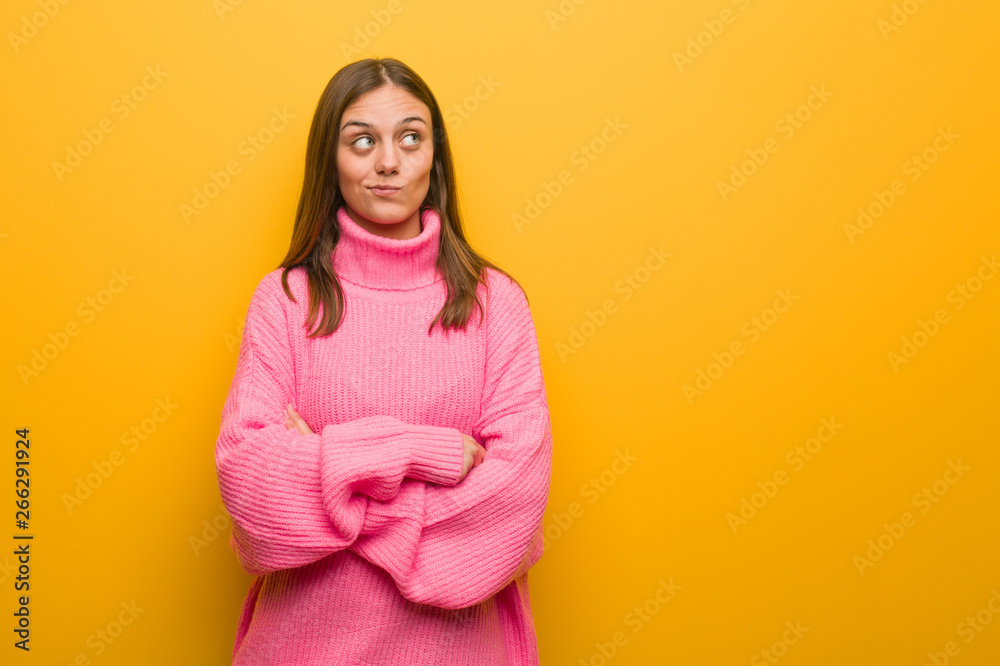 Young modern woman thinking about an idea Young modern woman thinking about an idea