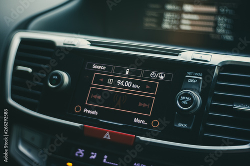 modern car dashboard with bokeh background, shallow depth of field, film look filter effect
