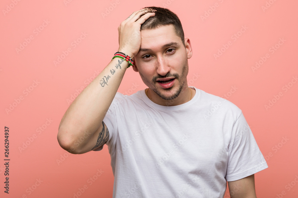 Young casual man tired and very sleepy keeping hand on his head. Young casual man tired and very sleepy keeping hand on his head.