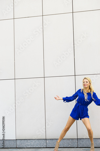 Fashion model wearing blue jumpsuit