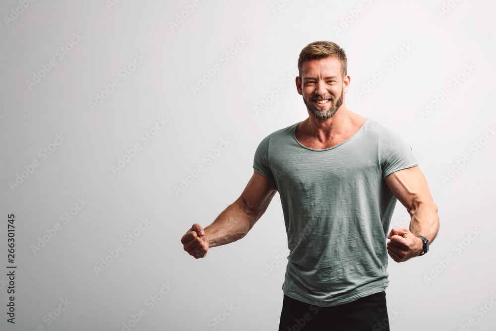 Successful handsome man on white wall Successful handsome man on white wall