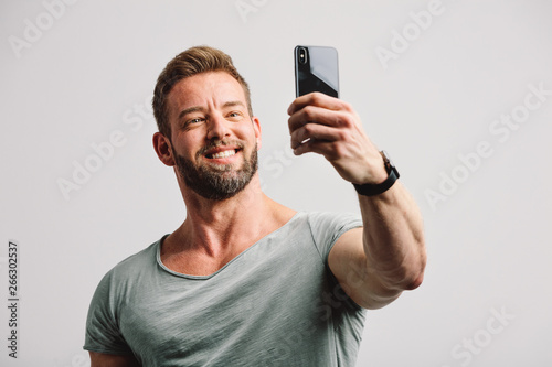 Handsome man taking selfie on the phone. © Photocreo Bednarek