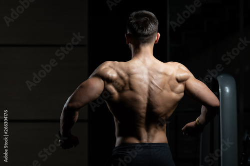 Physically Man Showing His Well Trained Back