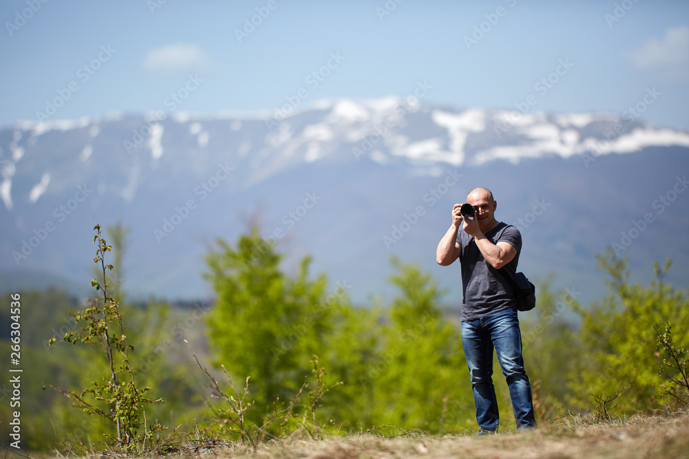 Photographer shooting landscapes