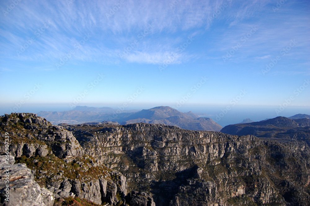 Table Mountain in South Africa, Cape Town, with mountains, sky, clouds, rocks,