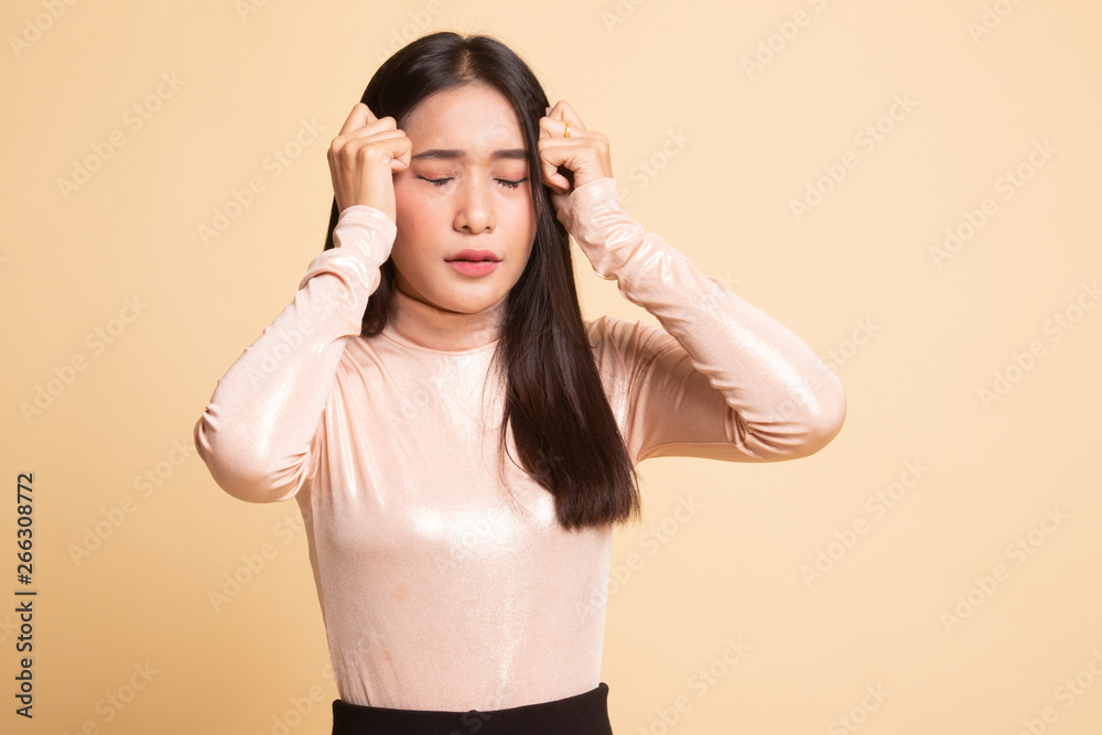 Young Asian woman got sick and headache. Young Asian woman got sick and headache.