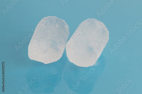 ice cubes on colorful background