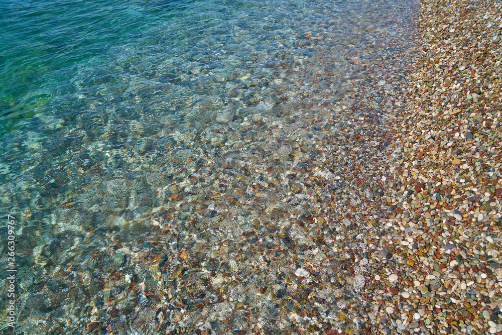 Pebble stone and sea background