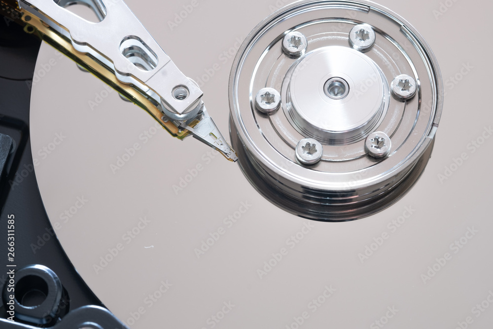 Hard drive from the computer hdd with mirror effect. Close-up, macro. Hard drive from the computer hdd with mirror effect. Close-up, macro.