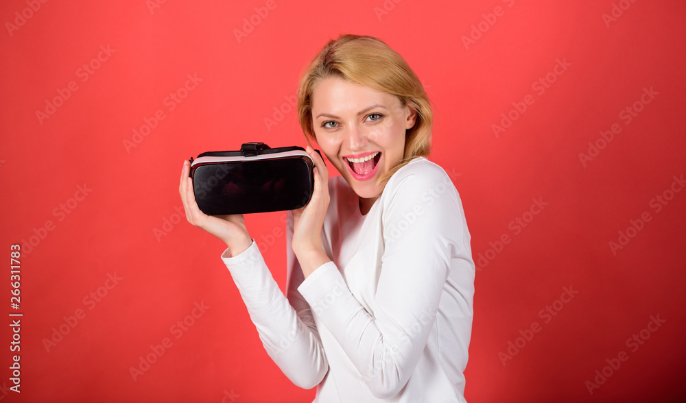 Young woman using a virtual reality headset with conceptual network lines. Woman using virtual reality headset. A person in virtual glasses flies in room space. Office innovation. Young woman using a virtual reality headset with conceptual network lines. Woman using virtual reality headset. A person in virtual glasses flies in room space. Office innovation.