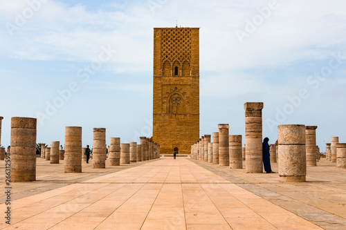 Tour Hassan tower in the square with stone columns. Made of red sandstone, important historical and tourist complex in Rabat, Morocco