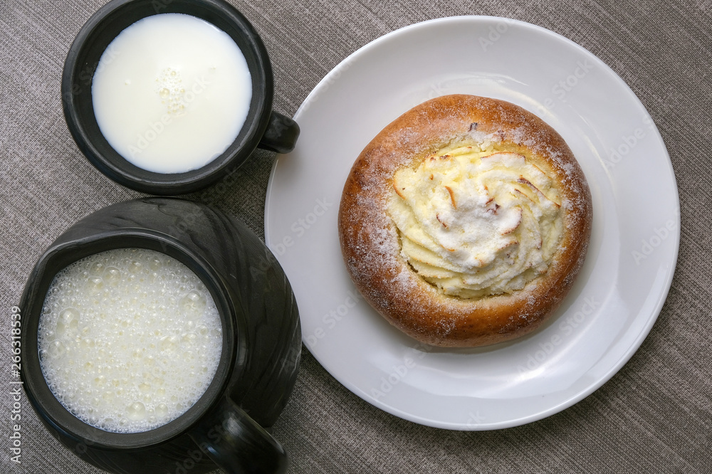 Still life with milk and sweet pastries on the table Still life with milk and sweet pastries on the table