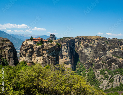 Beautiful view of the monastery of the Holy Trinity and its surrounding mountains in the region of Meteora, Greece