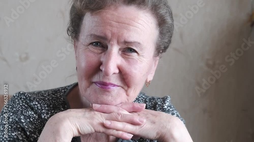 Portrait of a kind elderly smiling woman